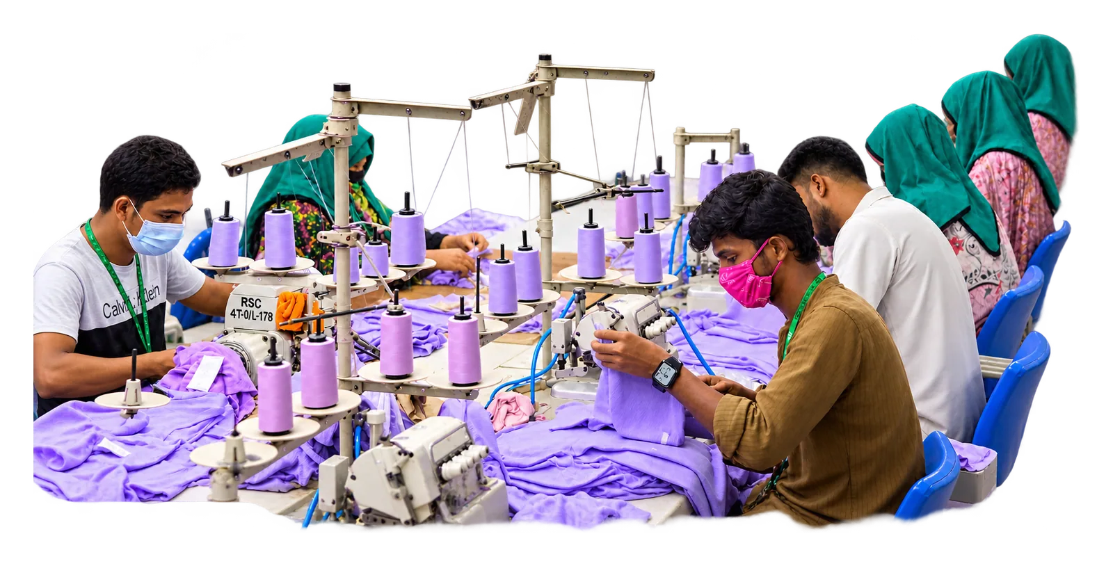 Overlock operators at a sewing line working through purple fabric